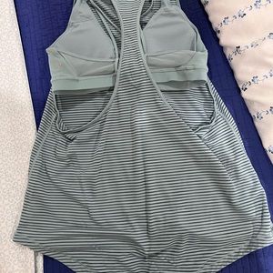 Turquoise striped Lululemon tank with built in sports bra. Size 4.